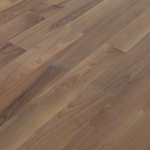 Engineered wood planks floor in European Walnut: brushed, stained, varnished.