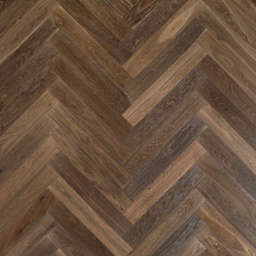 Herringbone 90° wood floor in Oak: smoked, brushed, stained, varnished.
