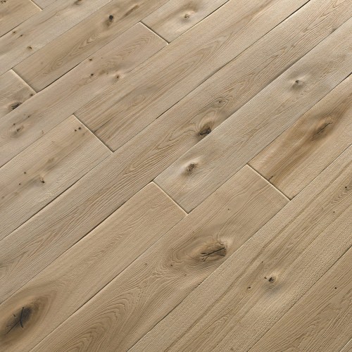 Engineered wood planks floor in Oak: brushed, stained, aged effect, had carved, varnished.